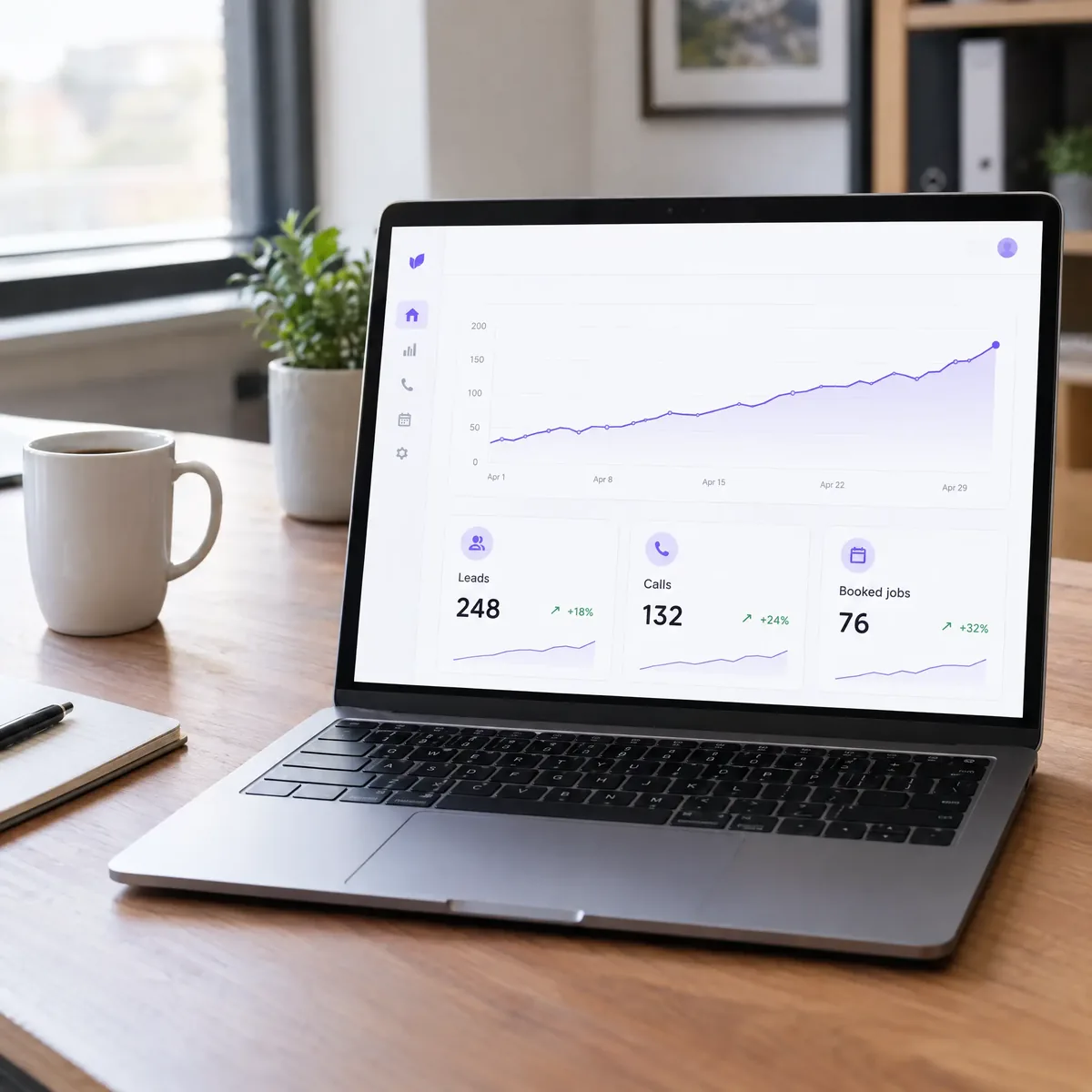 A laptop showing a simple leads and bookings dashboard